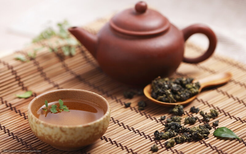 Tea ceremony setup with teapot and cup