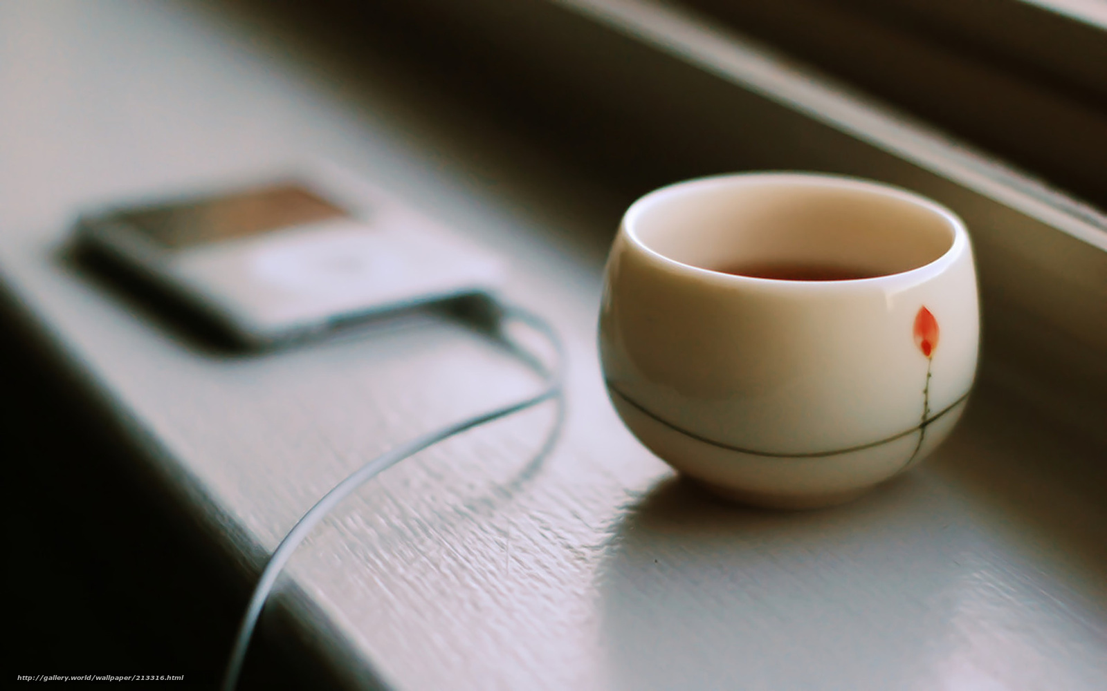 tea cup and music player