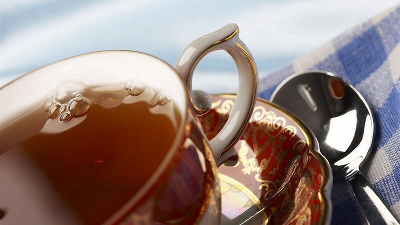 Tea Cup and Saucer — Brown