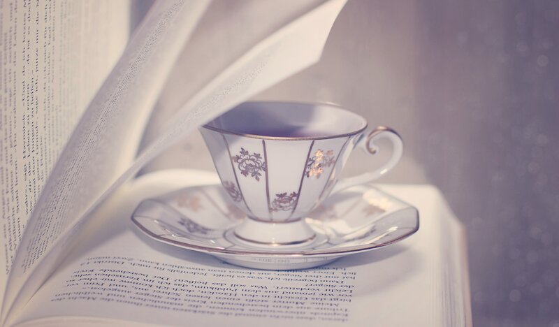 Tea Cup on Open Book