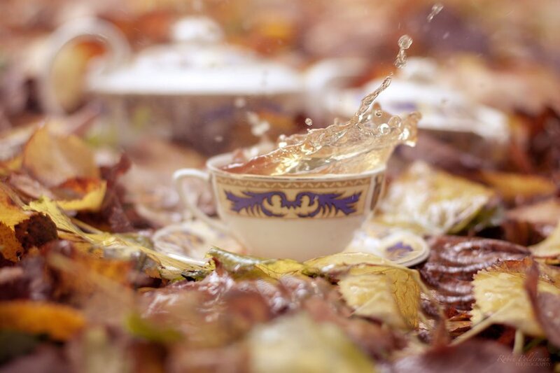 Tea Cup Splashing Leaves