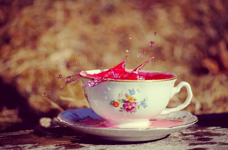 Tea Cup Splashing Liquid