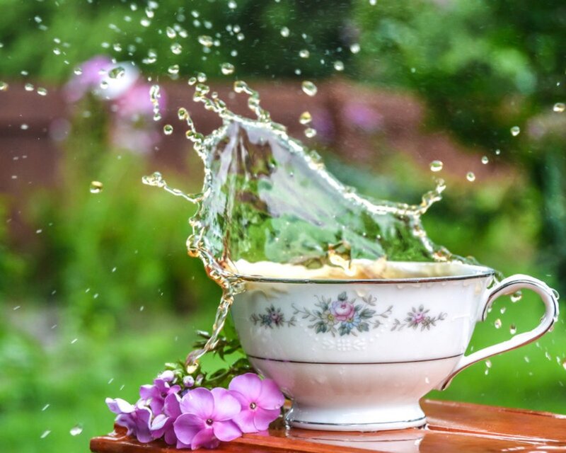 Tea Cup Splashing Water — White