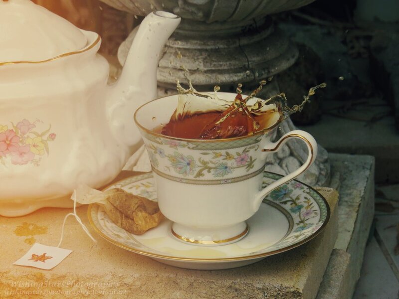 Tea Cup Splashing — White, Dramatic, Afternoon