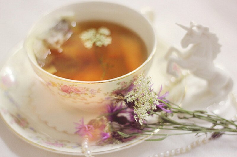 Tea Cup with Flowers — White, Serene, Photograph, Unicorn Figurine