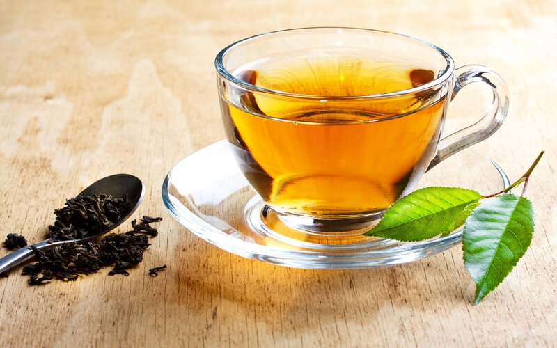 Tea cup with leaves