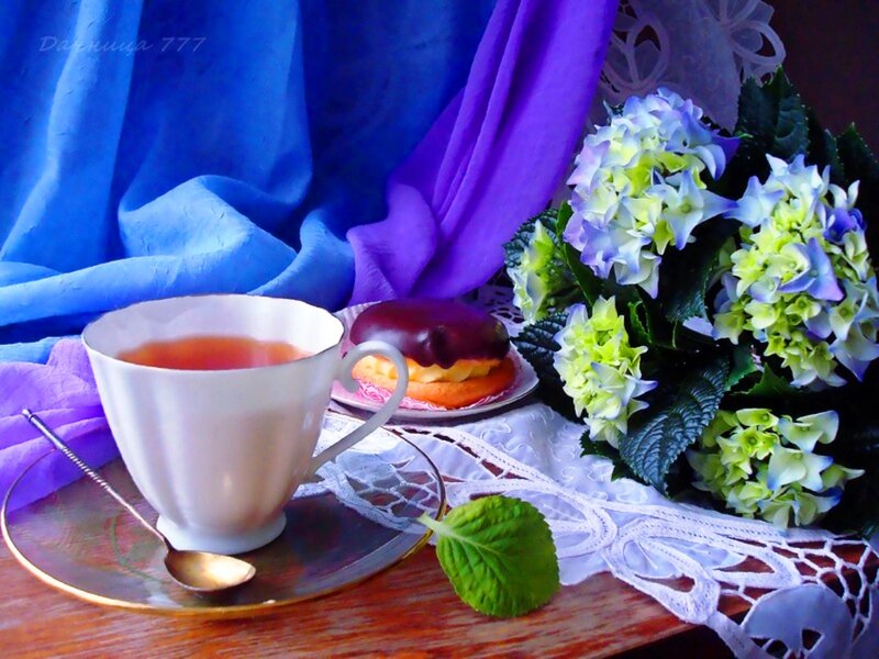 Tea Cup with Pastry