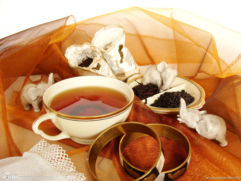 Tea Cup with Tea Leaves — Orange