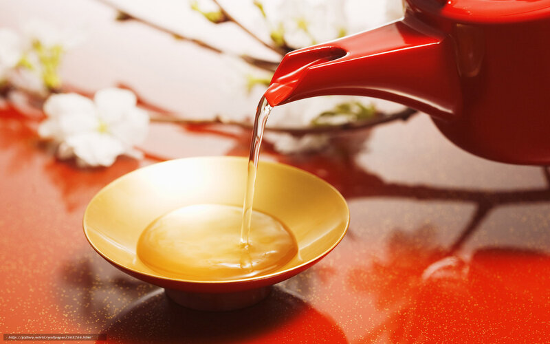 tea pouring into cup