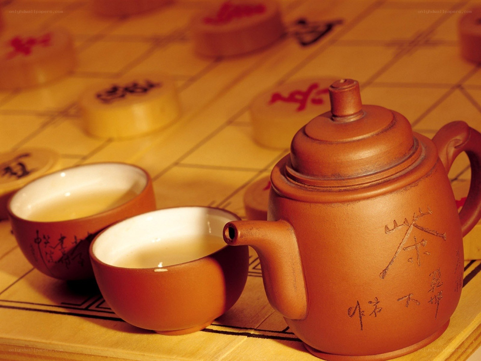 Tea set on a chessboard