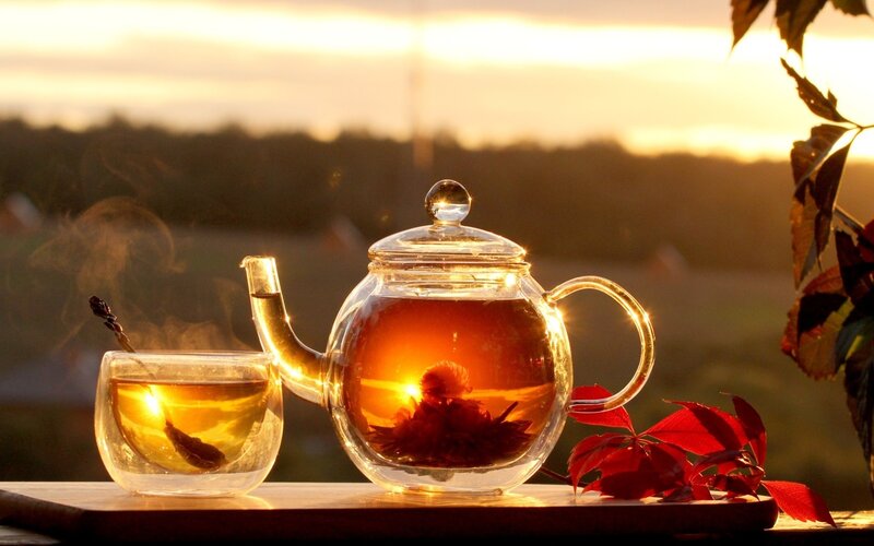 Tea Set on Wooden Surface — Gold