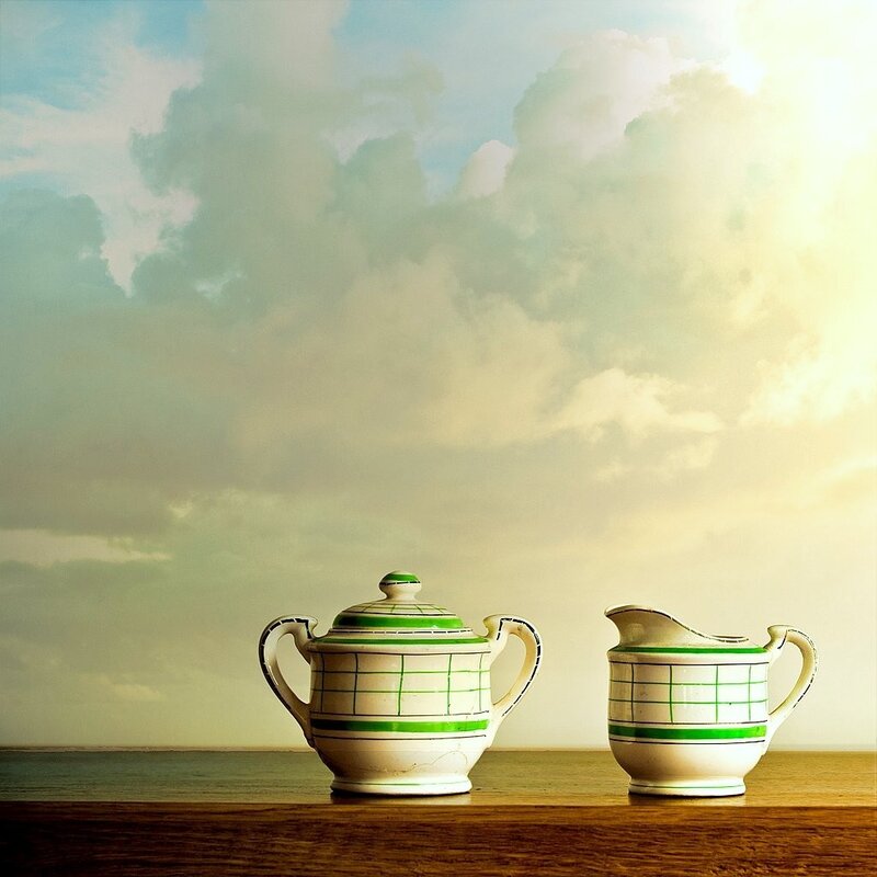 Tea Set on Wooden Surface — White