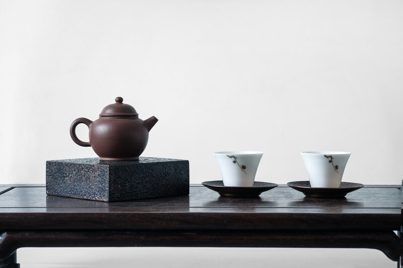 Tea Set on Wooden Table — Brown, Serene, Photograph, Teapot, Cups, Saucers