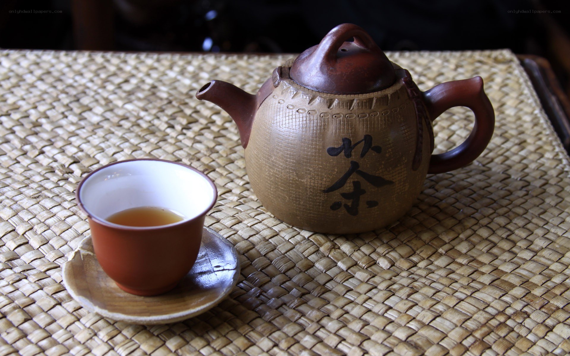 Tea set on woven mat