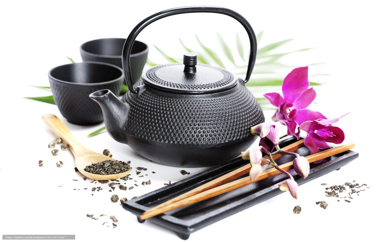 Tea set with orchid and leaves