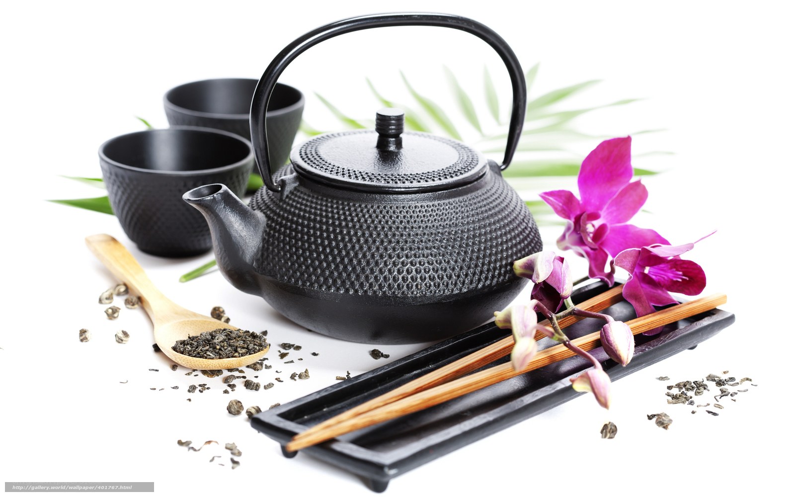 Tea set with orchid and leaves