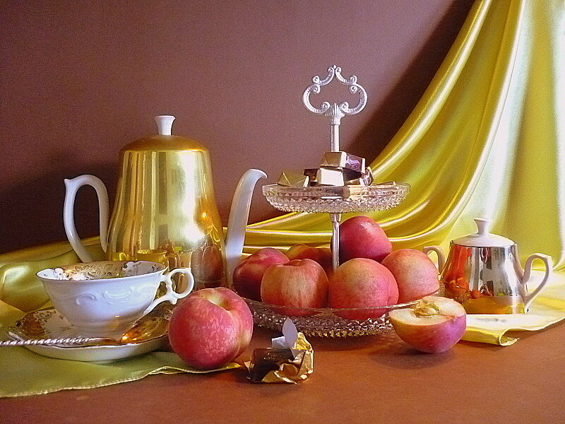 Tea set with peaches and chocolates