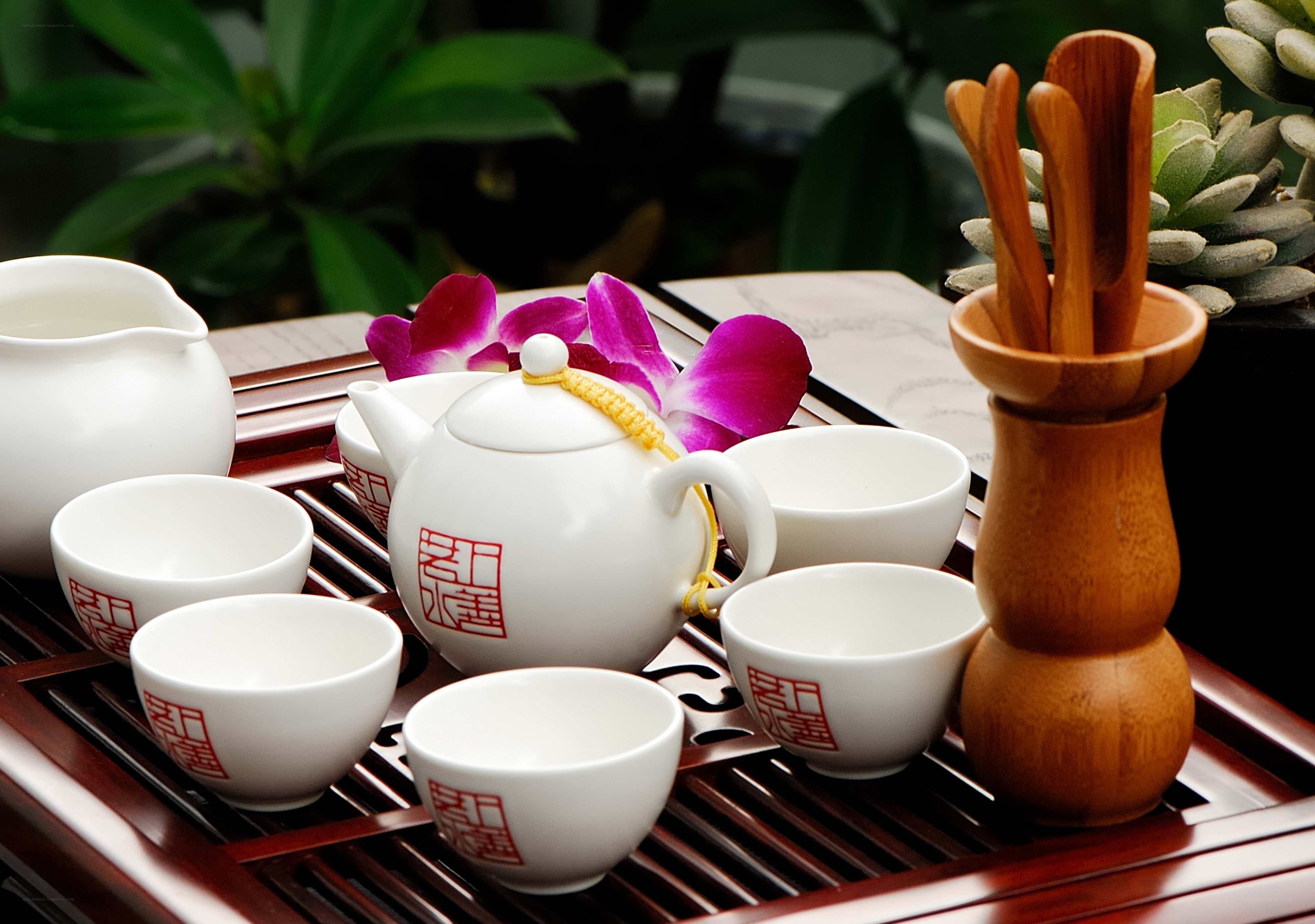 tea set with purple orchid