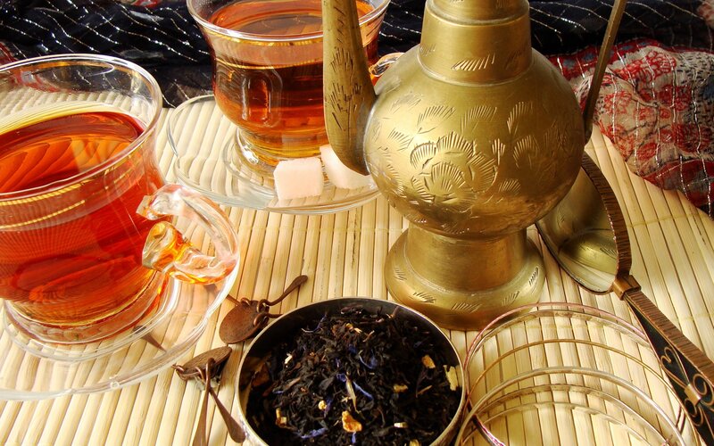 tea setup with brass kettle