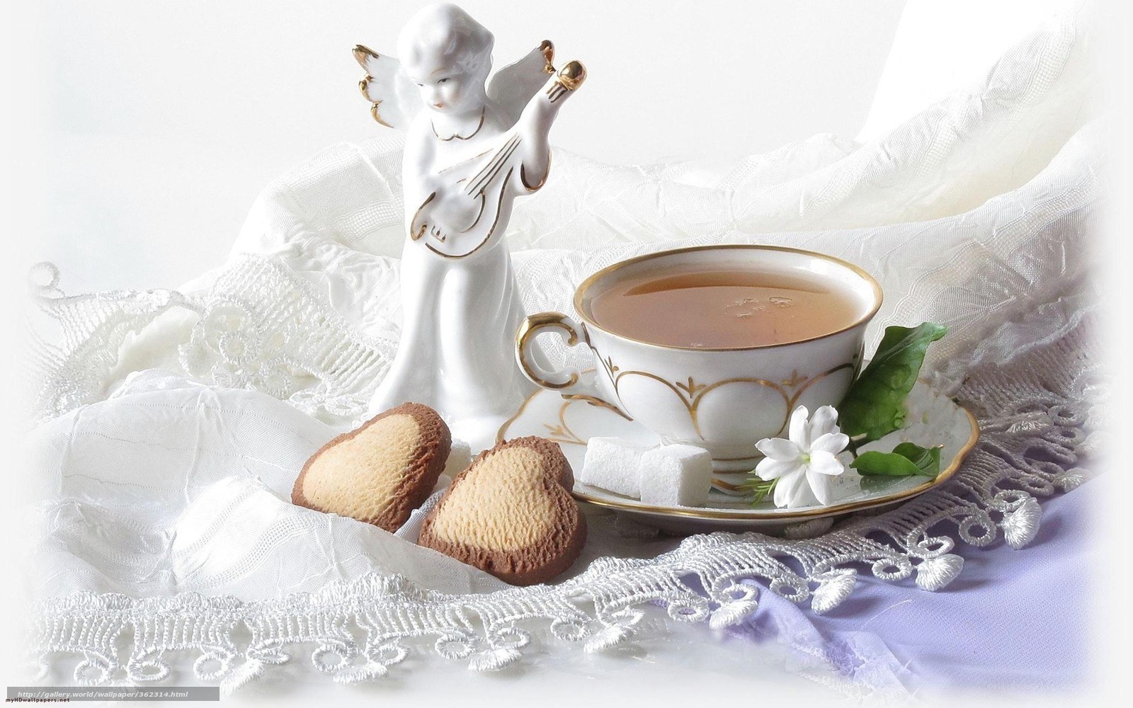 Tea time with angel figurine