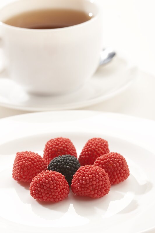 tea with berry candies