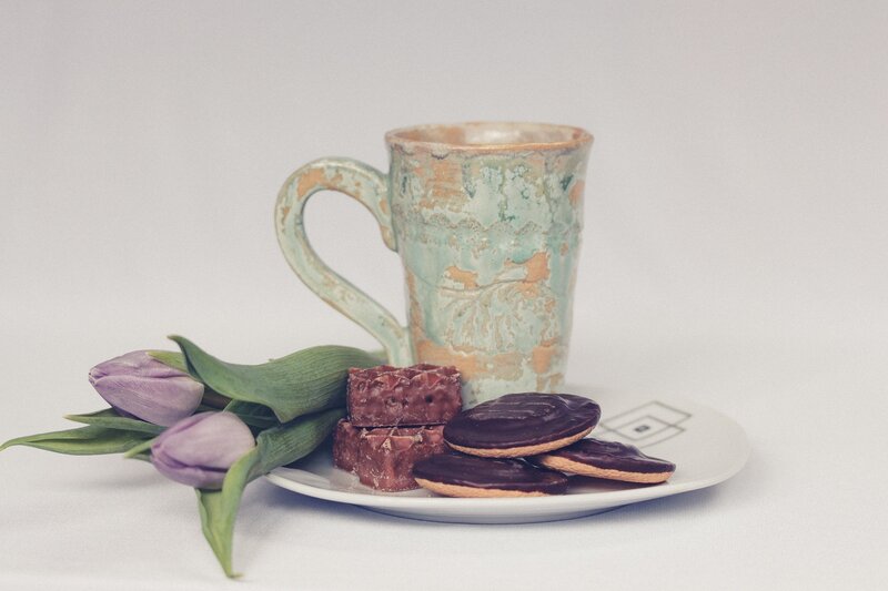 Tea with cookies and tulips