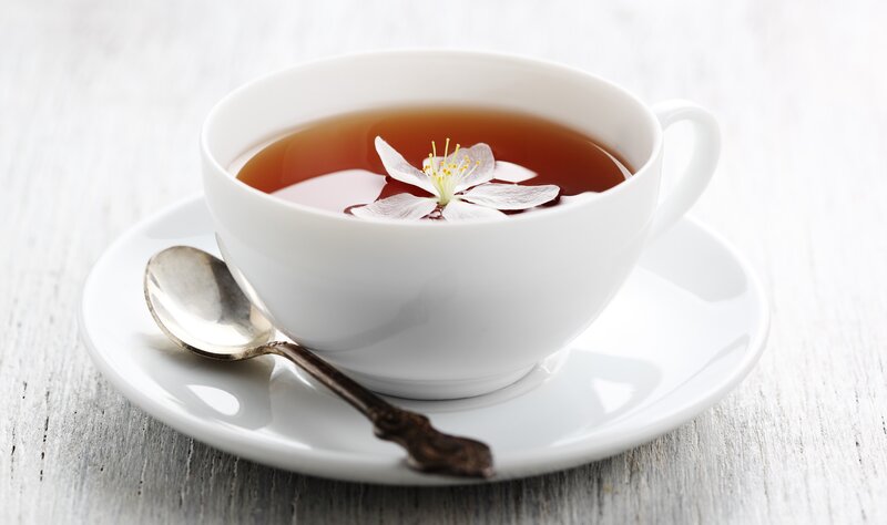 tea with flower garnish