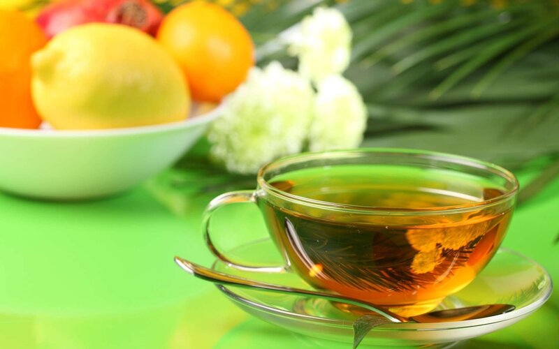 Tea with fruit and flowers