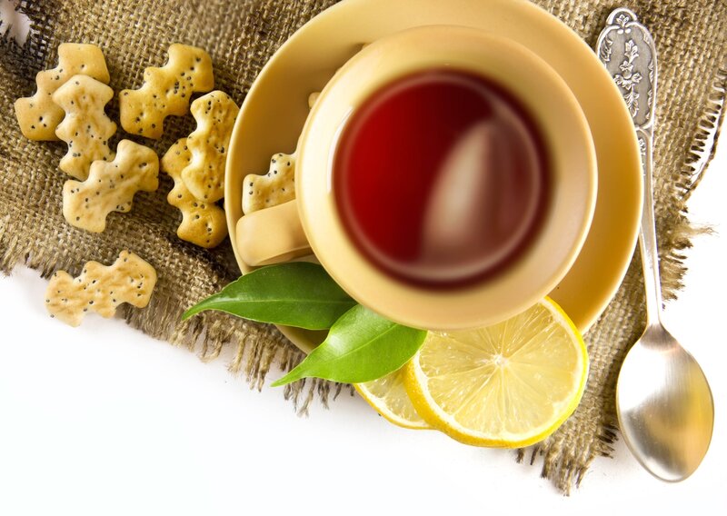 Tea with lemon and biscuits