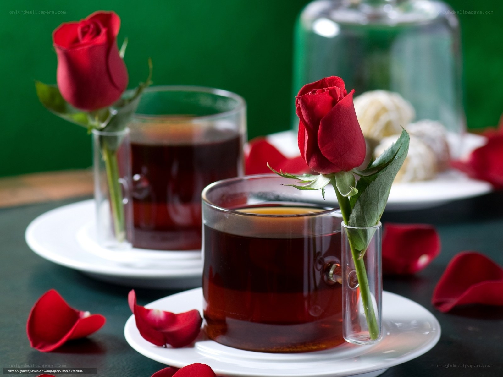 Tea with roses on table