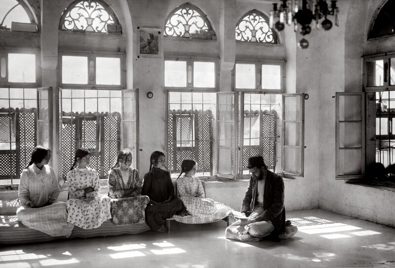 Teacher instructing students in a classroom