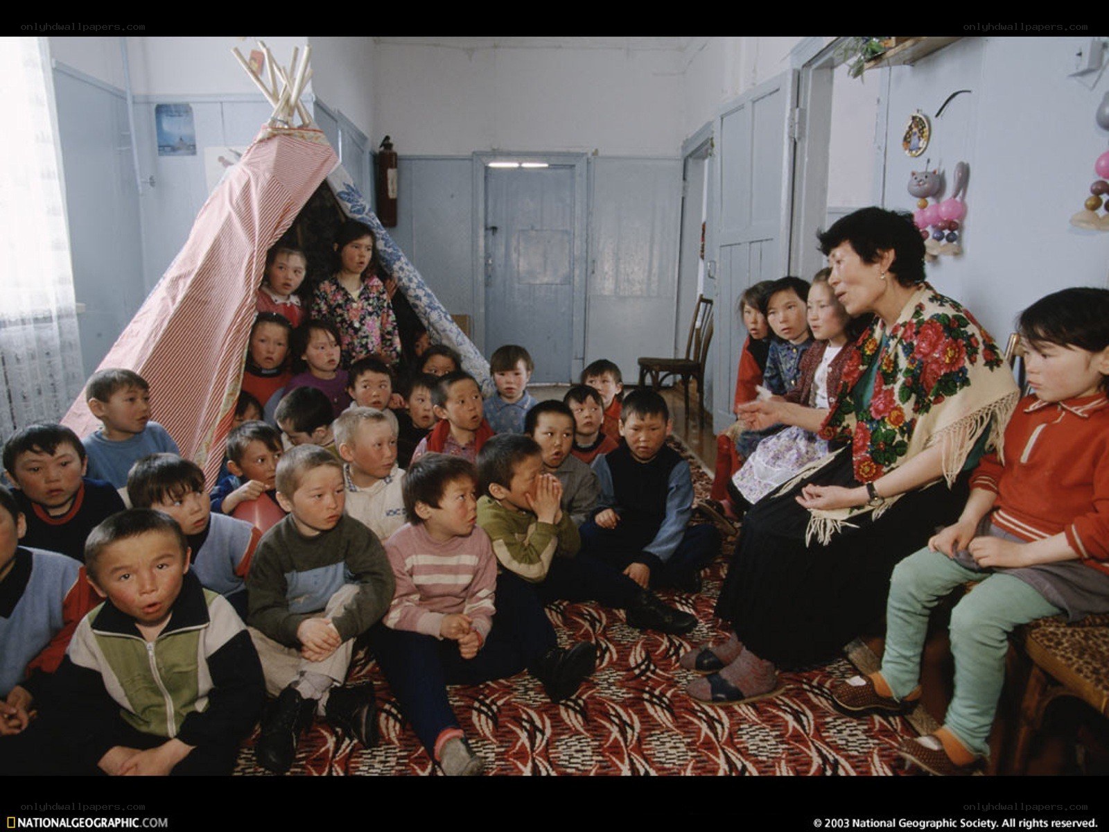Teacher with children in classroom