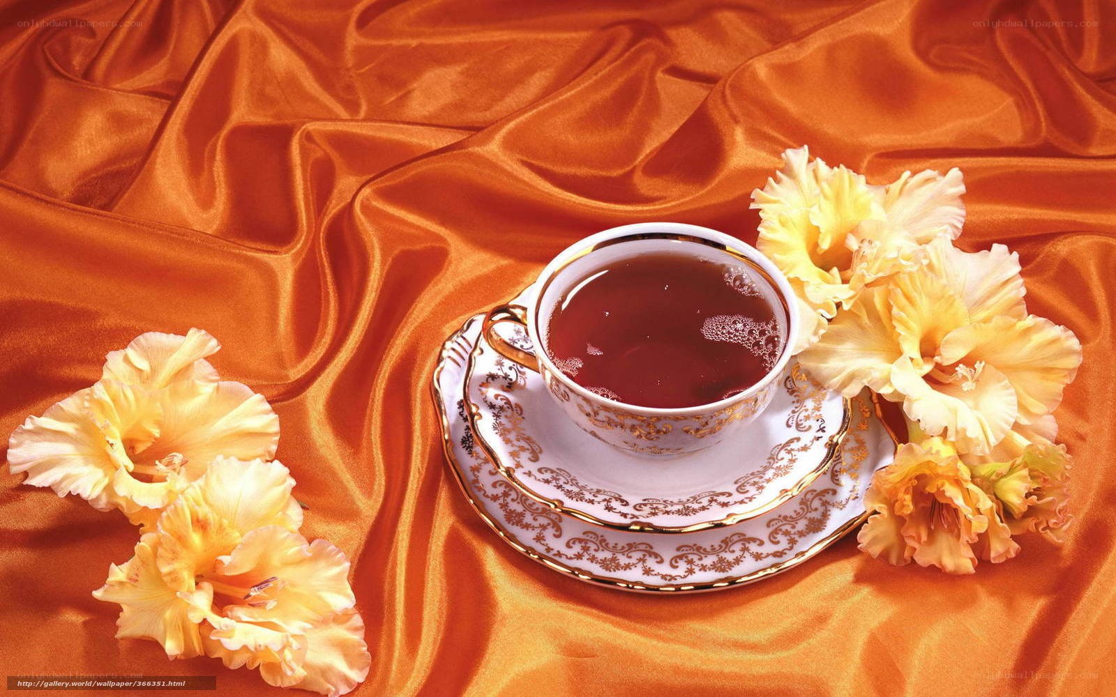 Teacup on satin with flowers