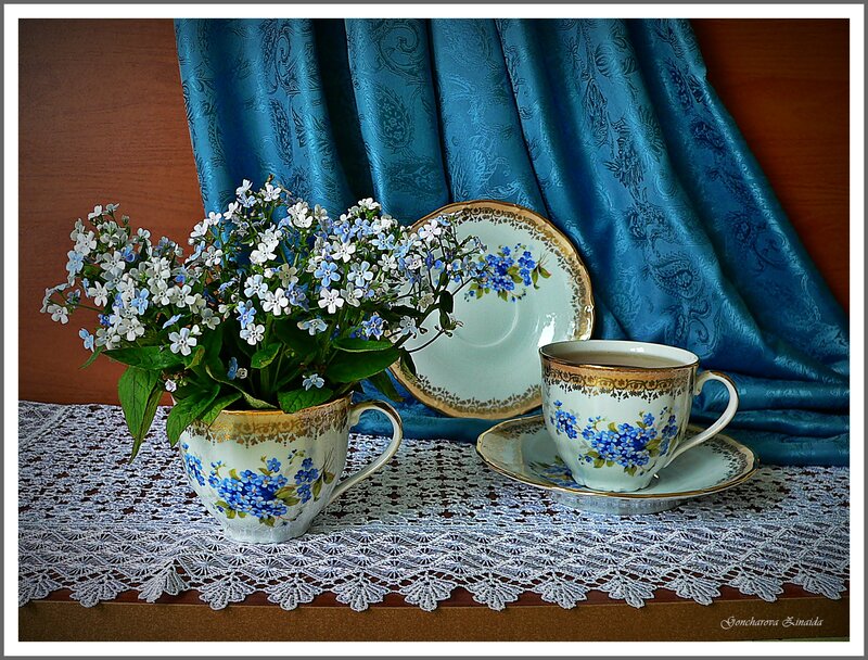 Teacup still life with flowers