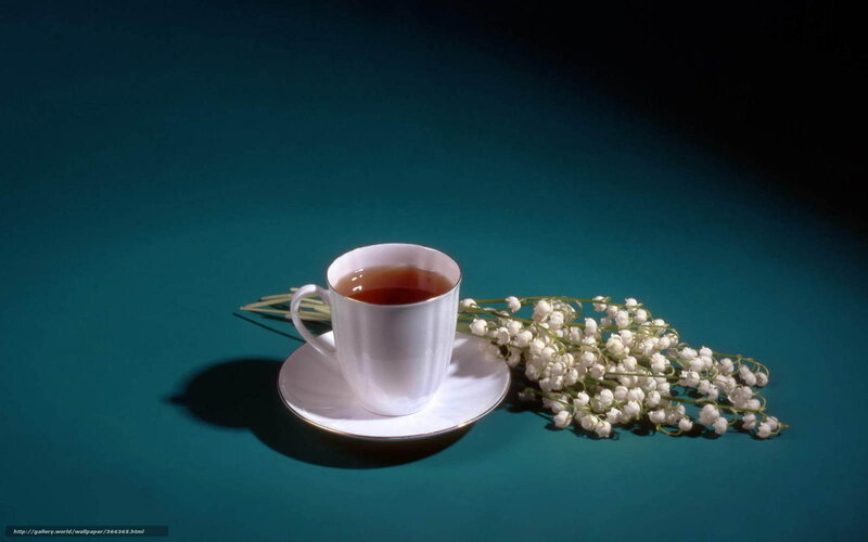 Teacup with lily of the valley