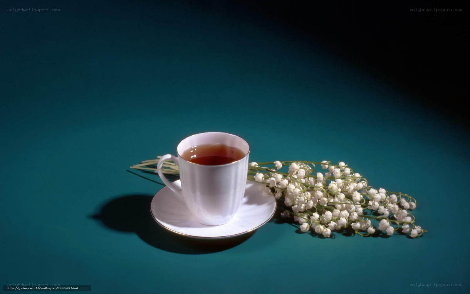 Teacup with lily of the valley