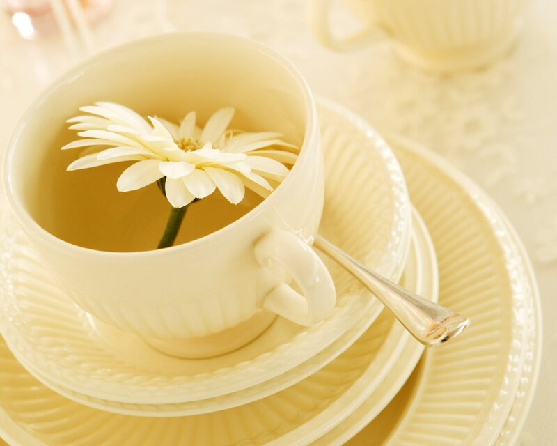 Teacup with white flower