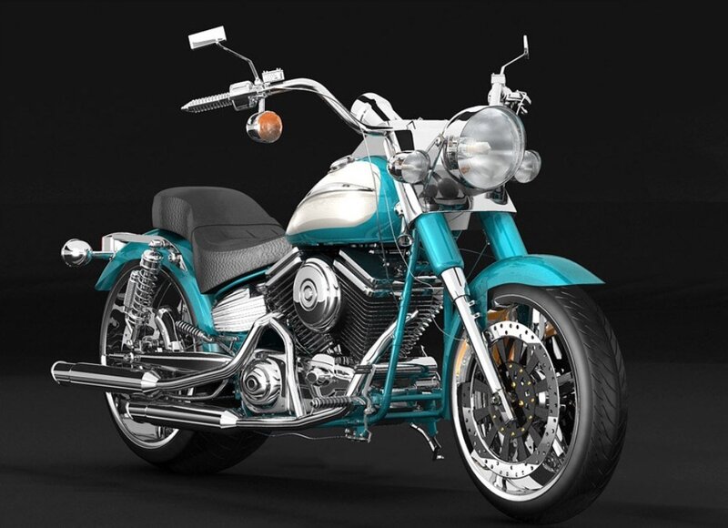 teal and silver motorcycle