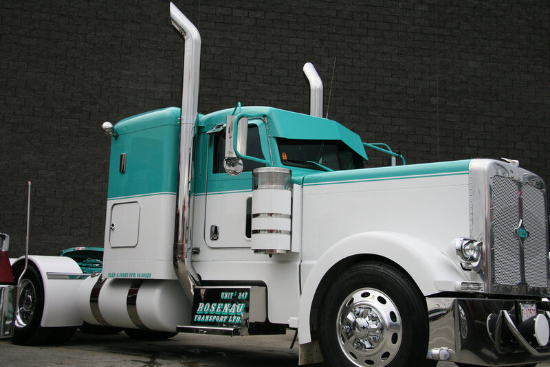 teal and white semi-truck