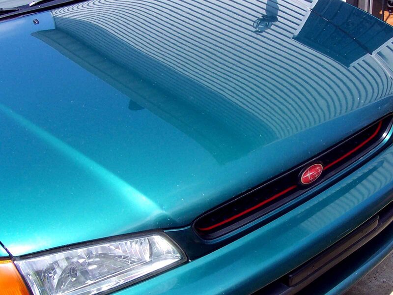 teal car front view