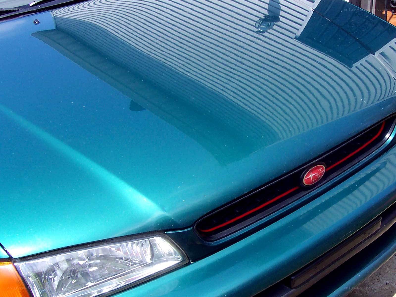 teal car front view