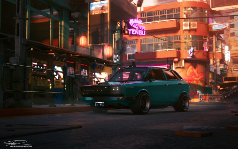 Teal Car on City Street