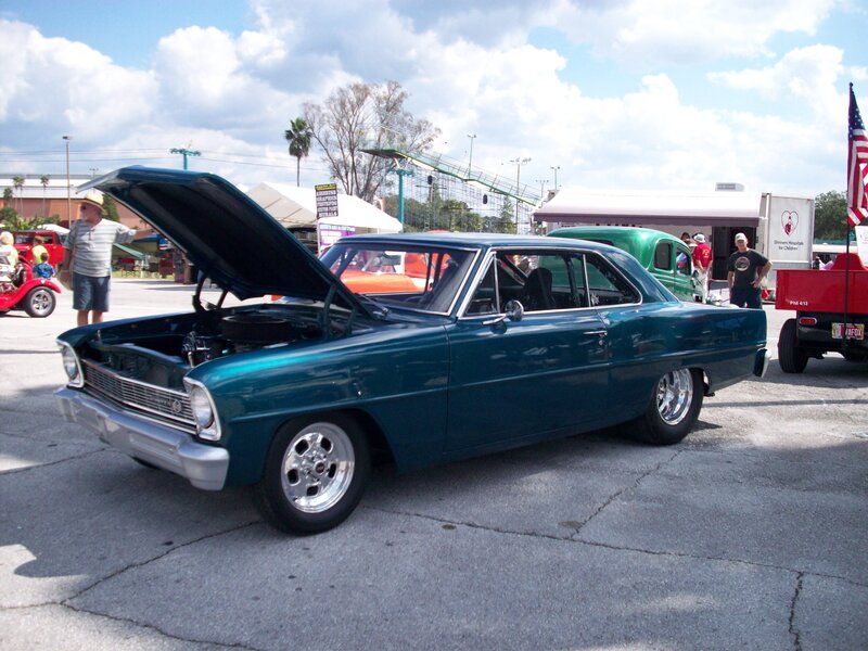 Teal Classic Car — Outdoor, Afternoon, Photograph, People