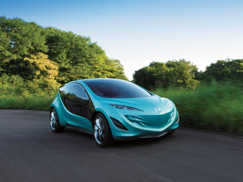 Teal concept car on road