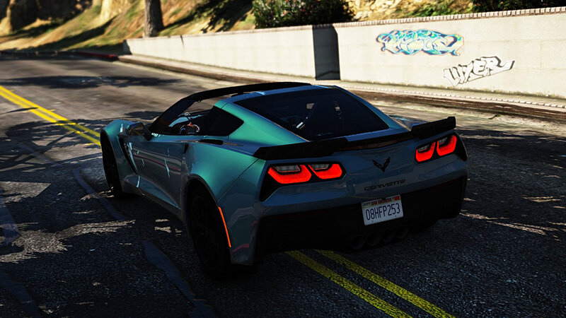 Teal Corvette on Road