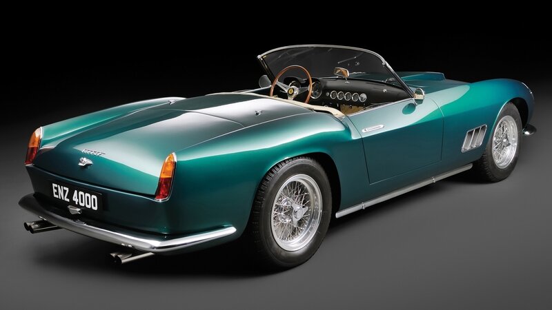Teal Ferrari convertible sports car