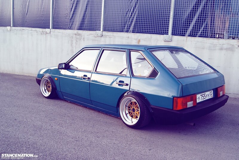 Teal Hatchback Car
