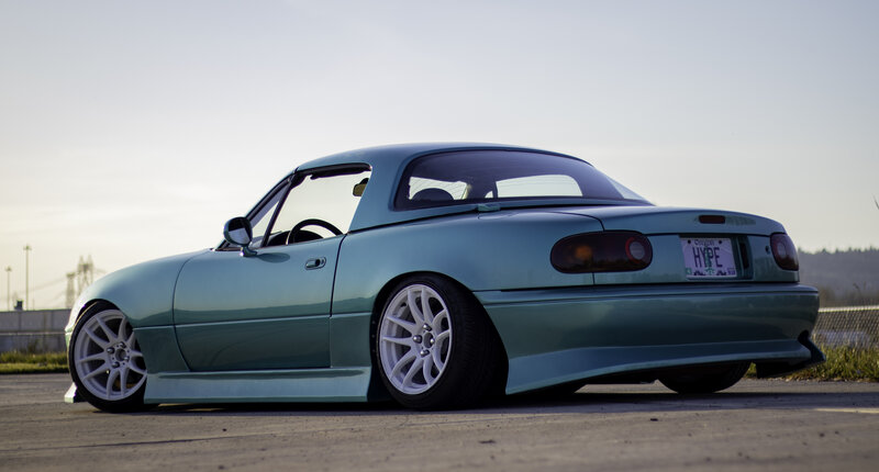 Teal Mazda Miata Car