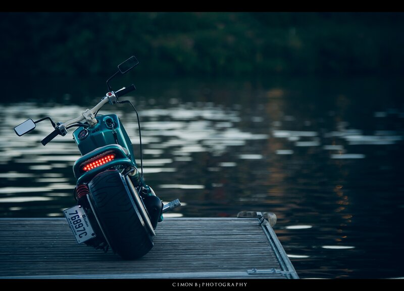 Teal Motorcycle on Dock