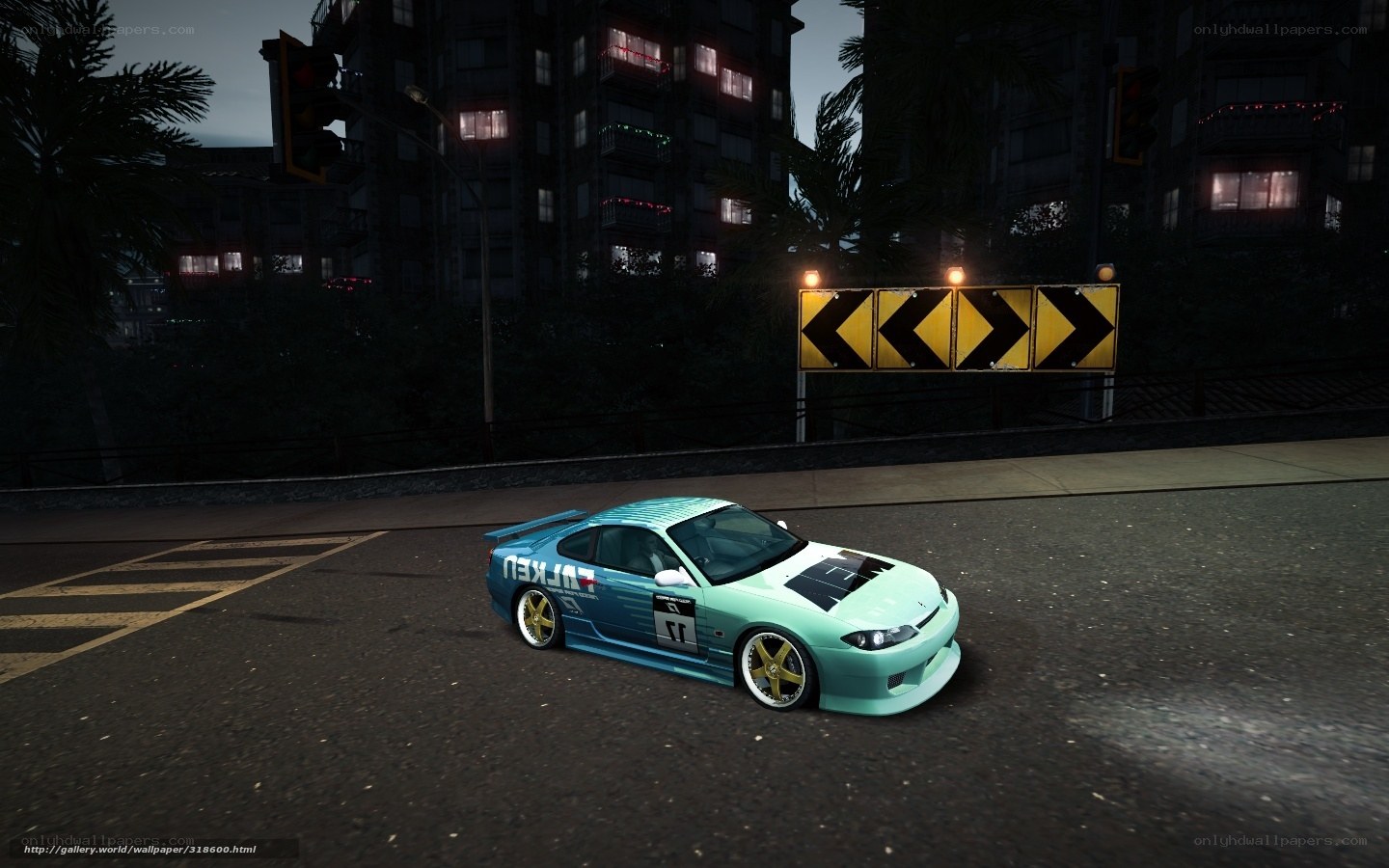teal race car at night